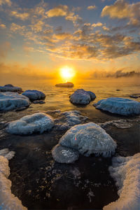 Scenic view of sunset over sea