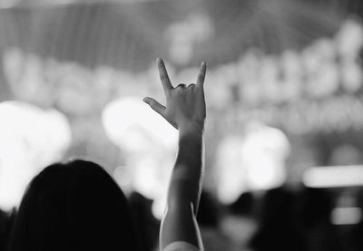 Cropped image of silhouette people at music concert