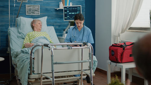 Doctor examining patient at hospital