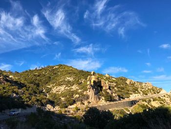 Low angle view of rock formation against sky