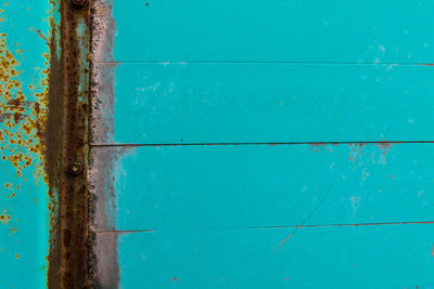 Full frame shot of blue metal wall
