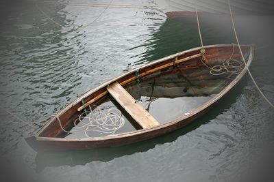 High angle view of boat sinking in lake