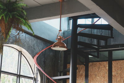 Decorative copper lamp hangind in loft house