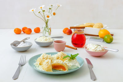 Fruit dumplings stuffed with apricots, low angle view of tasty dessert. 