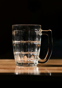 Close-up of drinking glass on table