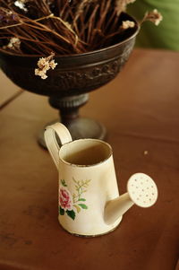 Close-up of coffee cup on table