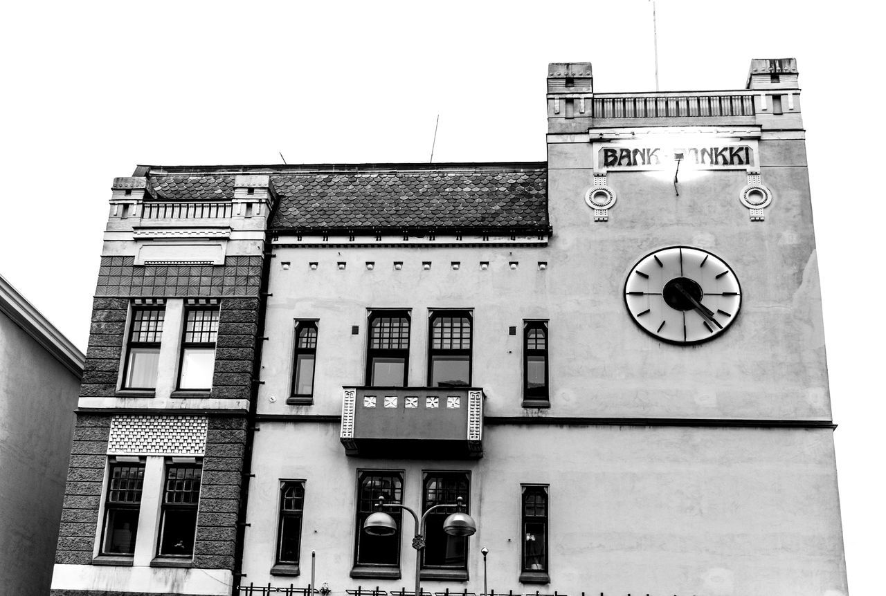 LOW ANGLE VIEW OF CLOCK TOWER