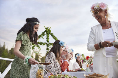 Family having midsummer dinner