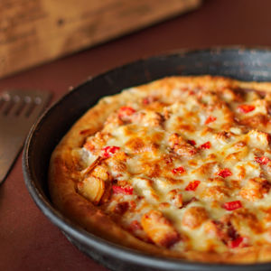 High angle view of pizza in bowl on table