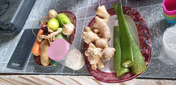 High angle view of fruits in plate on table