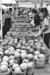 People at market stall
