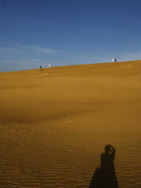 Scenic view of desert against sky