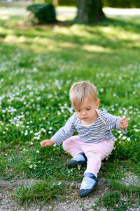 High angle view of cute boy on field