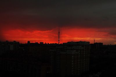 Silhouette of city during sunset