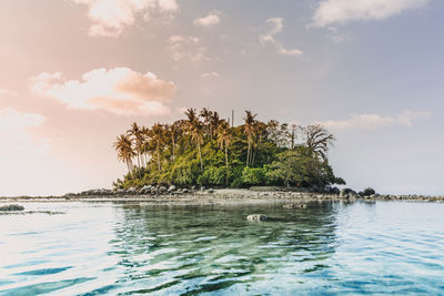 Tiny colorful island with transparent sea. koh pling, phuket thailand.