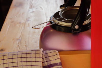 High angle view of water jug on table