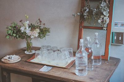 Flower vase on table at home