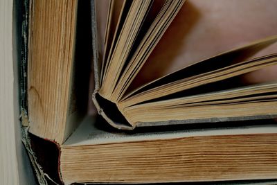 Close-up of books on wood