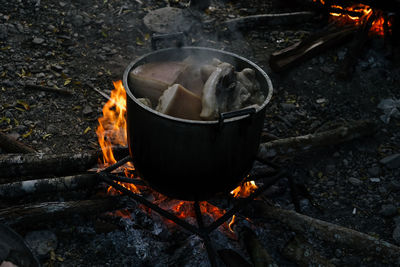 Close-up of food on campfire