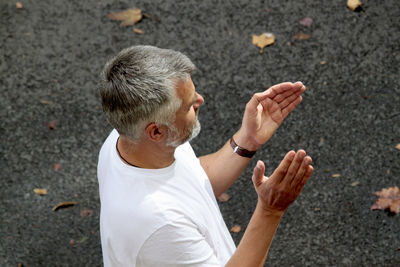 High angle view of man standing on ground