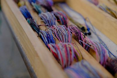 High angle view of string on wood