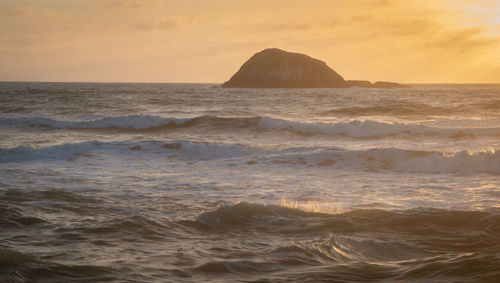 Scenic view of sea against sky during sunset