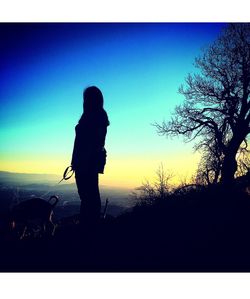 Silhouette of people at sunset