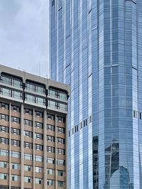 Low angle view of skyscrapers against sky