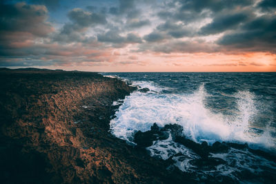 Scenic view of sea against sky during sunset