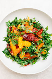 Citrus arugula salad with blood orange, cara cara and naval oragnes