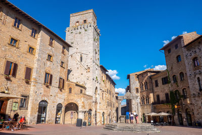 Ancient buildings on the main square of the city of san gimignano, tuscany