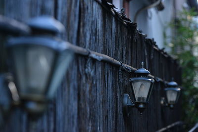 Close-up of wall lamps in a row
