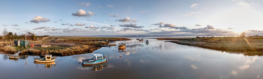 Small fishing boats moored at stone creek inlet, sunk island, east yorkshire, uk