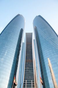 Low angle view of modern buildings against clear sky