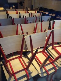 High angle view of chairs on table