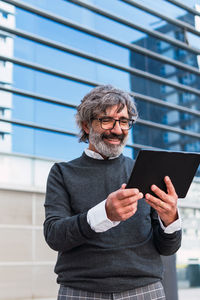 Young man using digital tablet