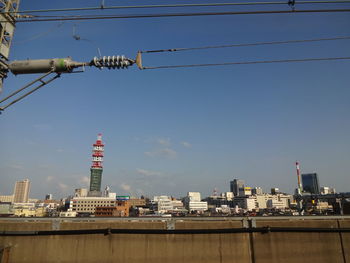 Buildings in city against sky