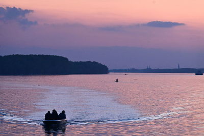 Scenic view of danube against sky during sunset