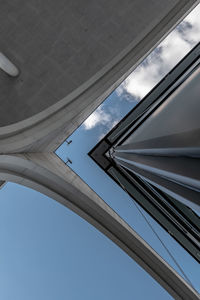 Directly below shot of buildings against sky