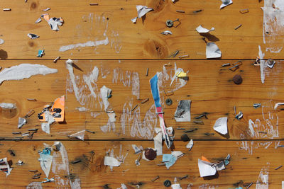 High angle view of objects on table against wall