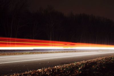 Light trails on road at night