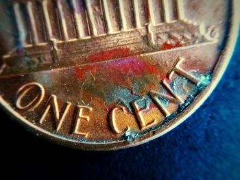 High angle view of coins on wall