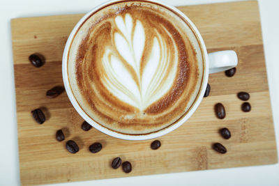 High angle view of cappuccino on table