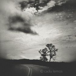 View of road against cloudy sky