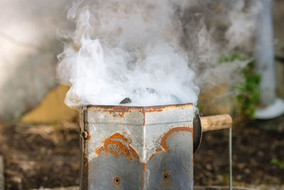 Close-up of smoke emitting from pipe