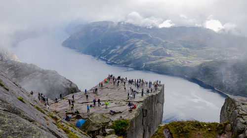 Panoramic view of people on mountain range