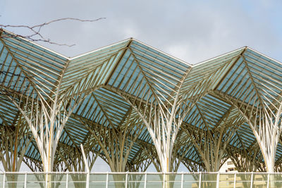  the railway platform of the oriente station, covered by a metal and glass truss