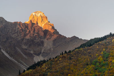 Scenic view of rocky mountains against clear sky