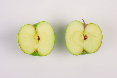 Close-up of apples against white background