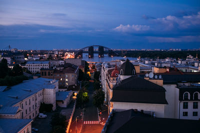 High angle view of illuminated buildings in city against sky